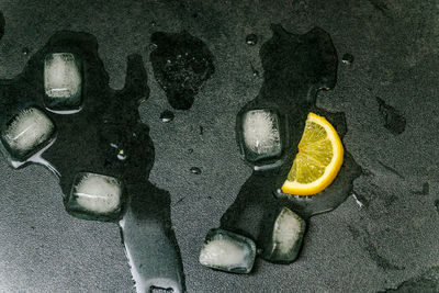 High angle view of yellow shoes on ground