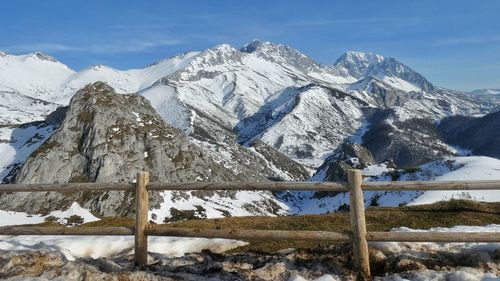 Snow covered mountains against sky