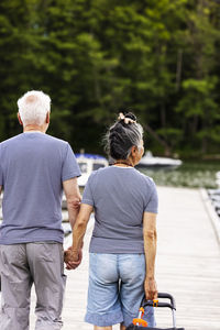 Senior couple resting at lakeside