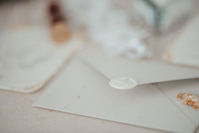 High angle view of paper on table