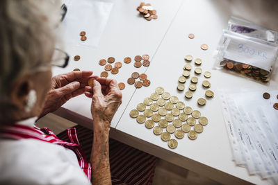 Woman counting coins