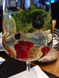 Close-up of wine in glass on table