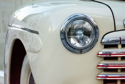 Close-up of vintage car headlight