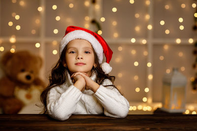 Portrait of cute baby girl at home