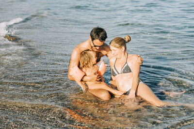 Family enjoying at beach