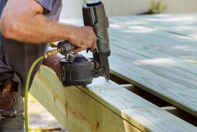 Man working on metal structure