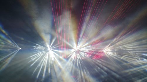 Low angle view of firework display at night