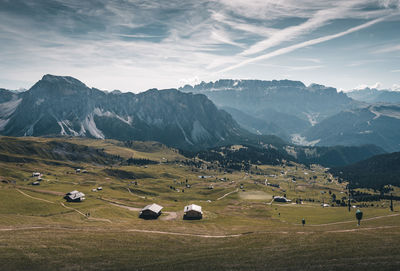 Scenic view of landscape and mountains against sky