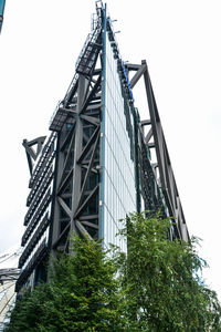 Low angle view of modern building against clear sky