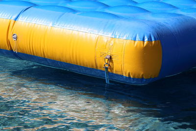 Close-up of yellow boat on sea