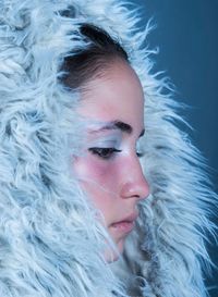 Close-up of woman wearing fur hood