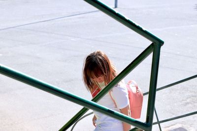 High angle view of girl playing in playground