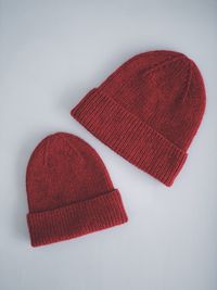 High angle view of red hat against white background