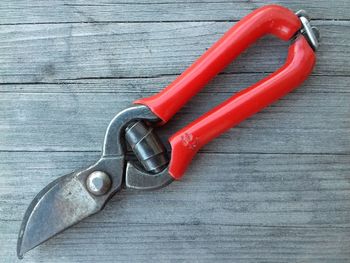 Close-up of red container on table