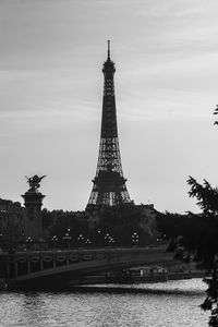 View of tower against cloudy sky