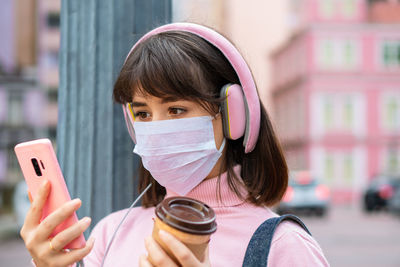 Young woman using mobile phone