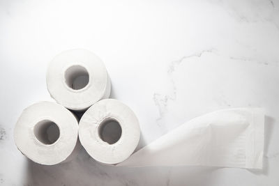 High angle view of papers against white background