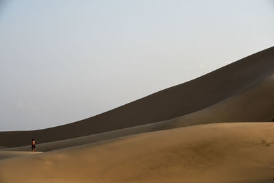 Scenic view of desert against sky