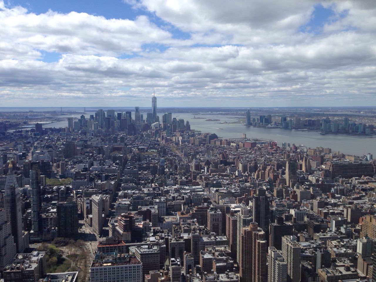 cityscape, city, architecture, building exterior, built structure, sky, skyscraper, crowded, water, sea, cloud - sky, modern, high angle view, tower, aerial view, office building, tall - high, capital cities, cloud, travel destinations