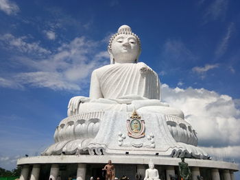 Low angle view of statue against sky