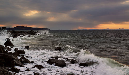 Scenic view of sea against sky during sunset