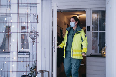 Ambulance staff leaving patient's home