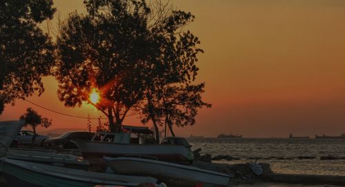 Scenic view of sea against orange sky