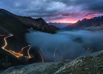 Scenic view of mountains against sky during sunset