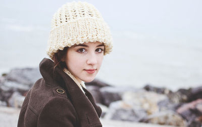 Portrait of beautiful young woman on beach