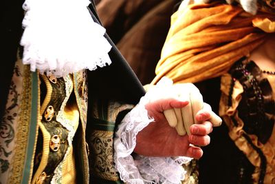 Cropped image of woman holding hands