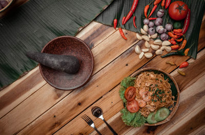 High angle view of various fruits on cutting board