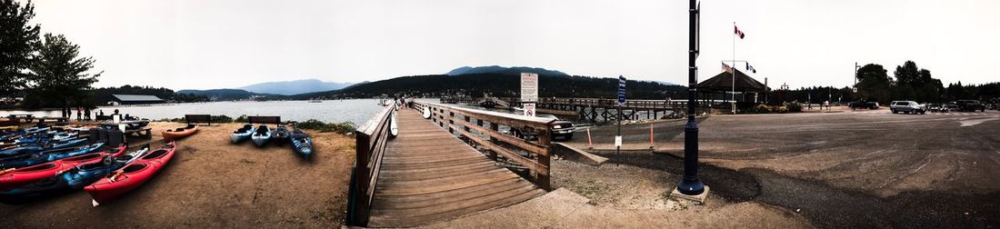 Panoramic view of pier and lake against sky