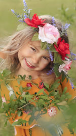 Porter of beautiful little girl wearing a flowers crown
