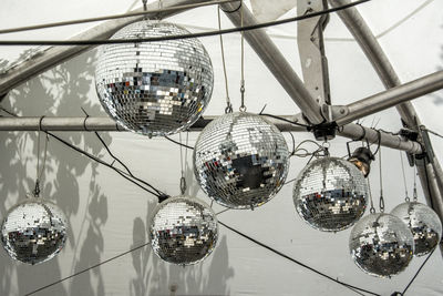 Low angle view of disco balls