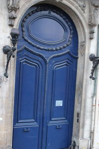 Low angle view of closed door of building