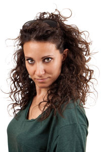 Portrait of a smiling young woman over white background