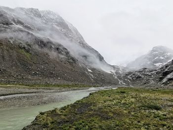 Alpine river on a rainy day