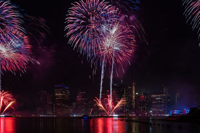 Firework display at night