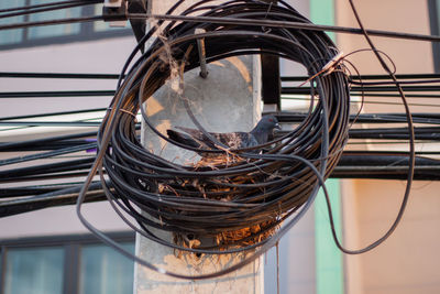 Close-up of electric lamp against clear sky