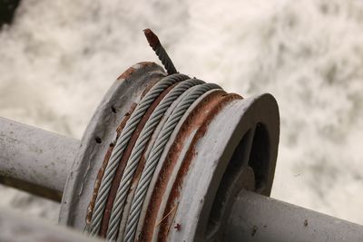Close-up of rope on rusty metal