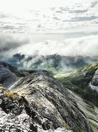 Idyllic shot of mountains in foggy weather