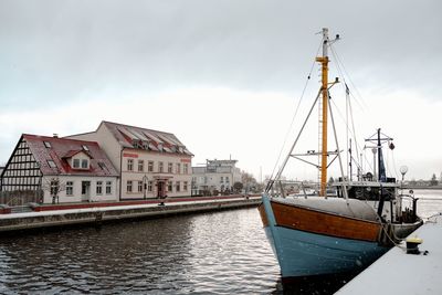 Boats in sea against sky