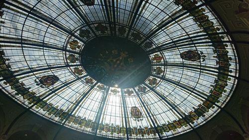 Low angle view of skylight in shopping mall