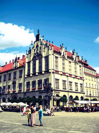 People in front of building