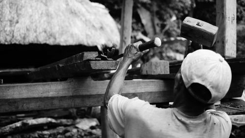 Close-up of young man holding hands