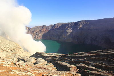 Scenic view of volcanic landscape against sky