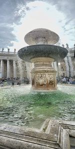 Fountain in front of historical building