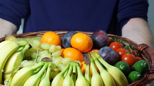 Close-up of hand holding vegetables