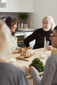 Family sitting at table at home