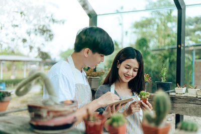 Man and woman having food in restaurant